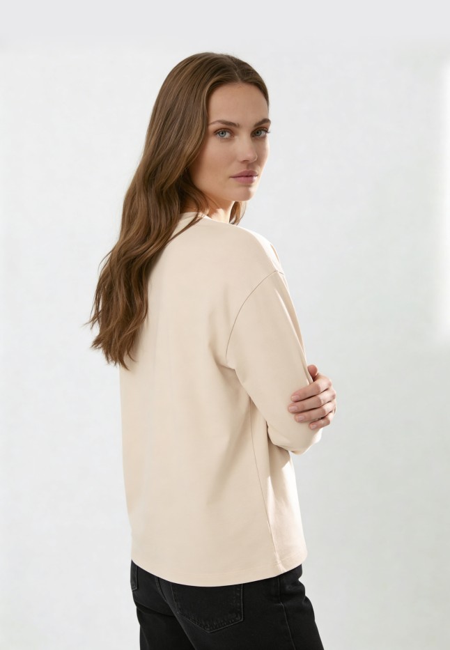Фото Женский лонгслив, цвет бежевый